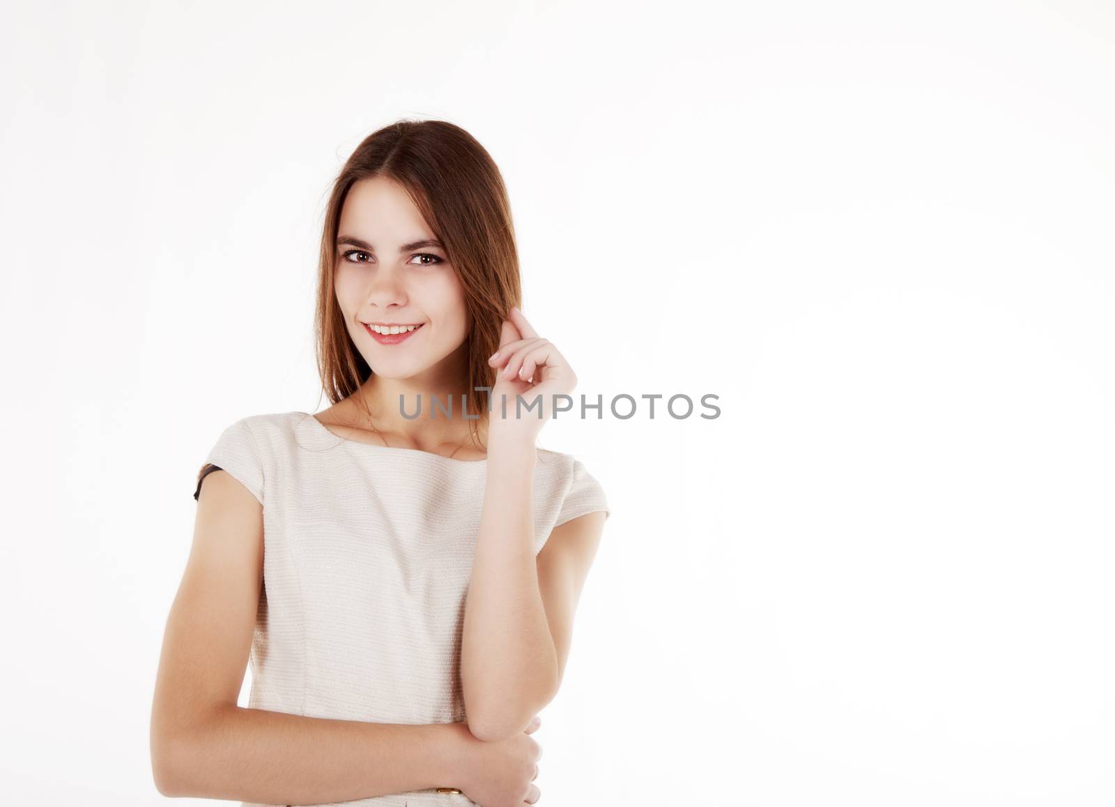young beautiful girl in a bright dress on a white background