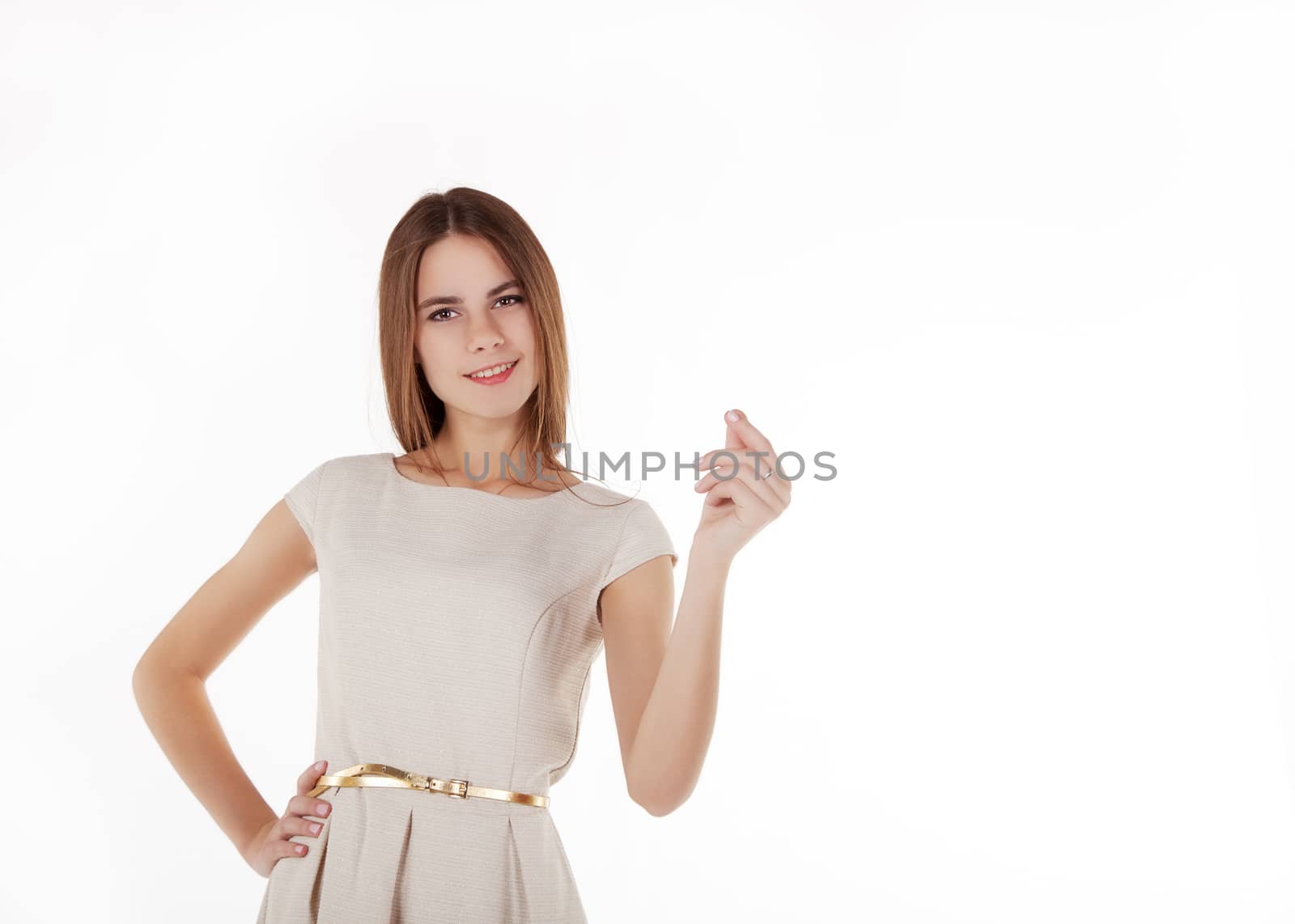young beautiful girl in a bright dress holding an imaginary credit card