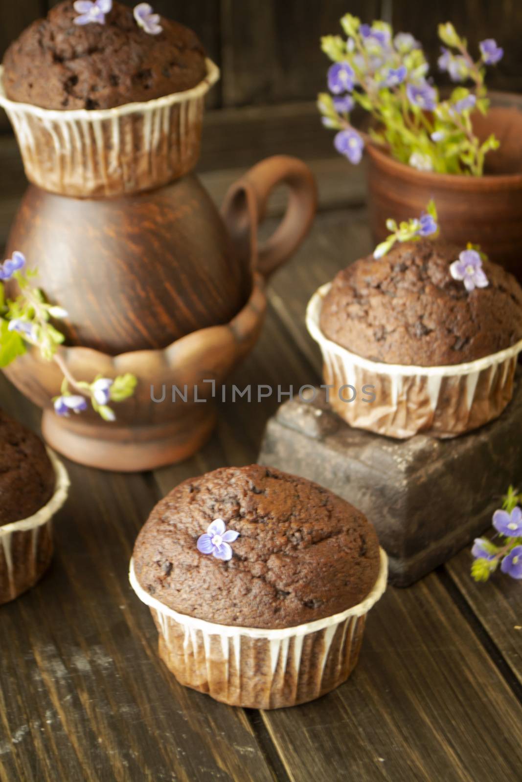 chocolate maffin and chocolate bar with blue little flowers