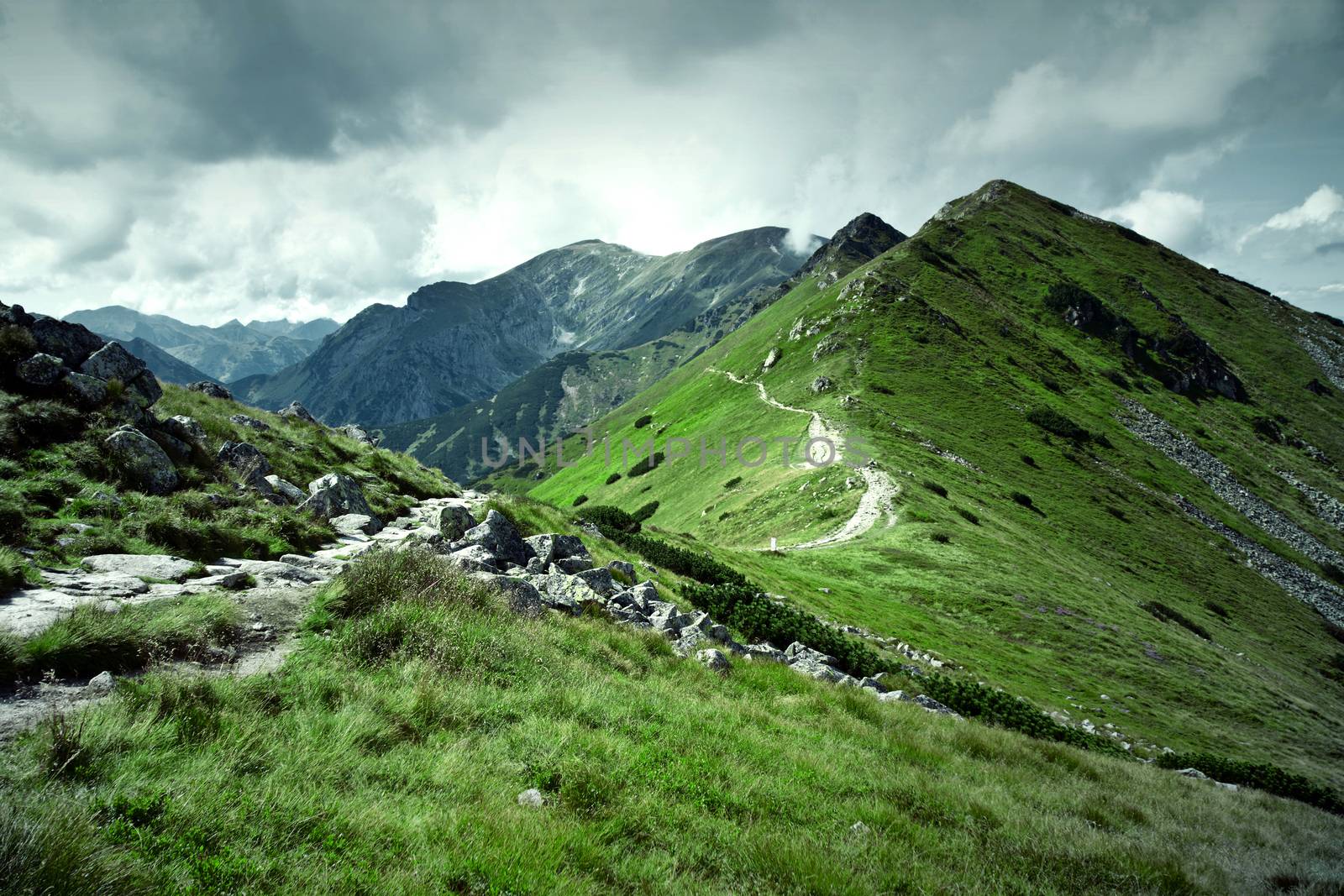 Green mountains and dark cloudy sky. by satariel