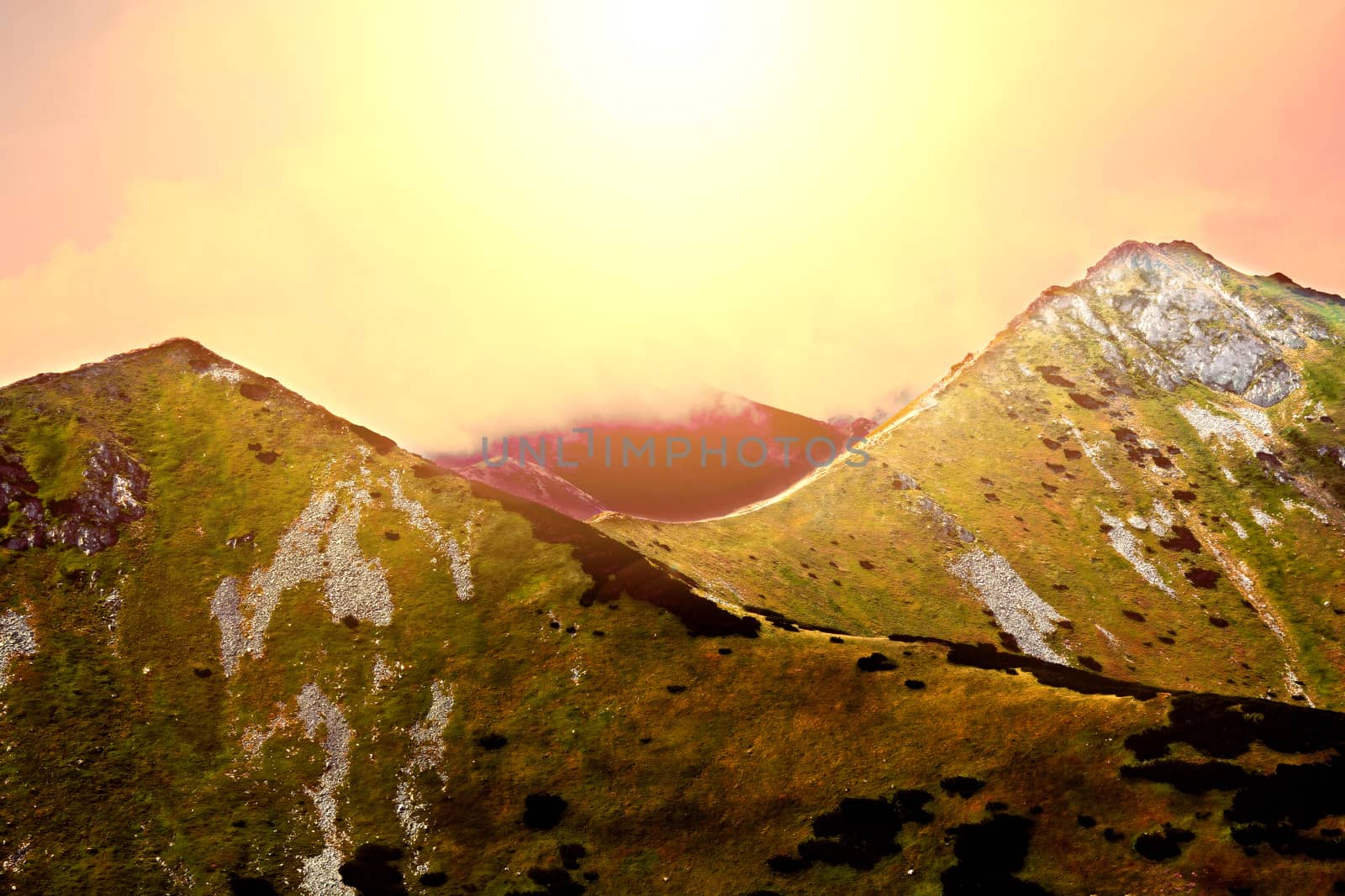 Mountains. Fantasy and colorfull nature landscape. Nature conceptual image. Sunset over mountains.