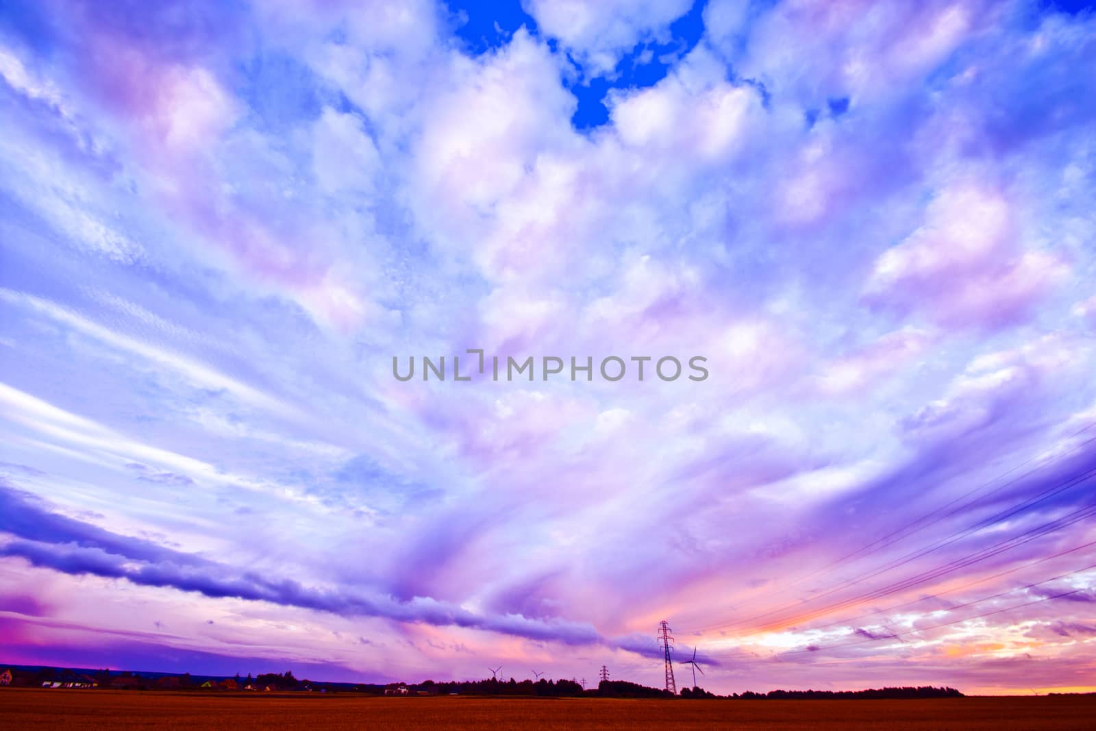 Beautiful colorful sky landscape with after storm clouds. Nature conceptual image.