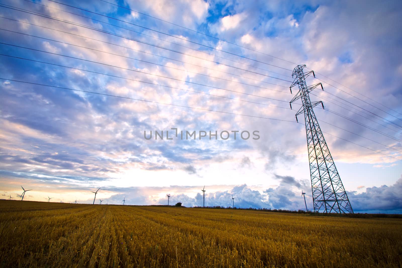 High voltage post with field and sky. by satariel