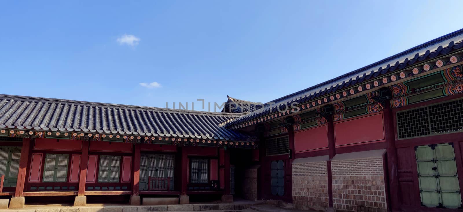 Ancient Korean structure inside the ancient Gyeongbokgung Palace, Seoul, Korea during bright day and blue sky