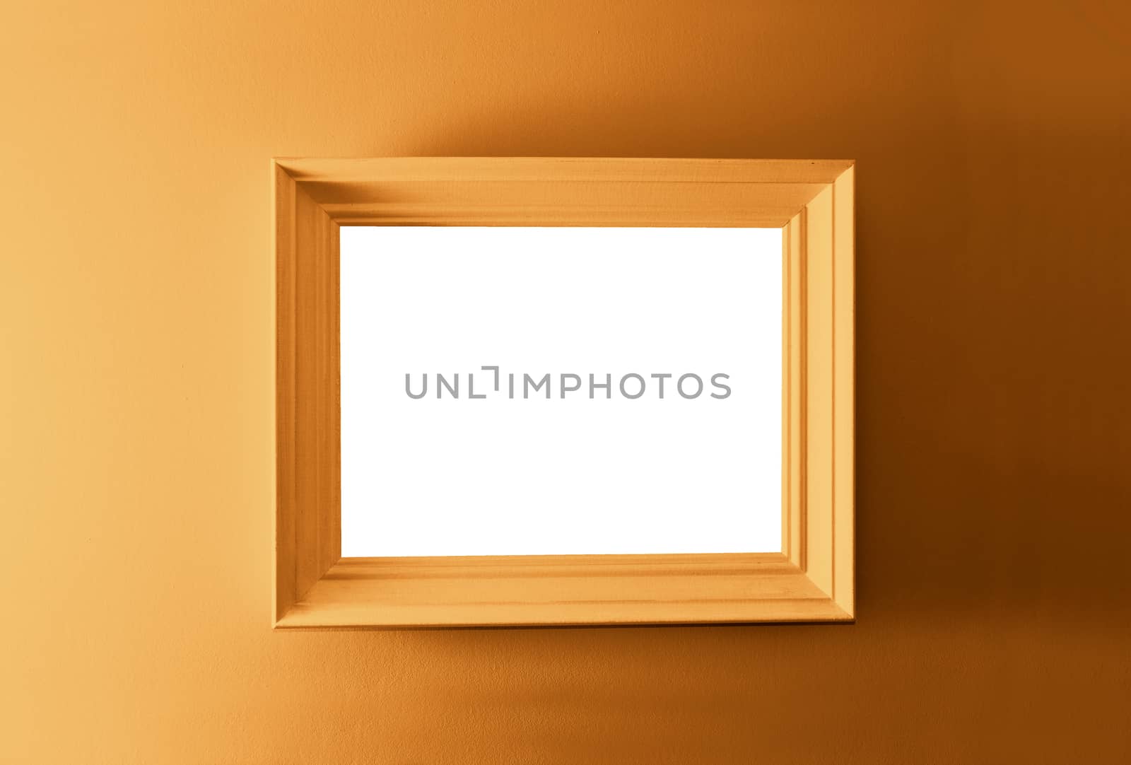 White empty frame on the brown wall. Free copy space.