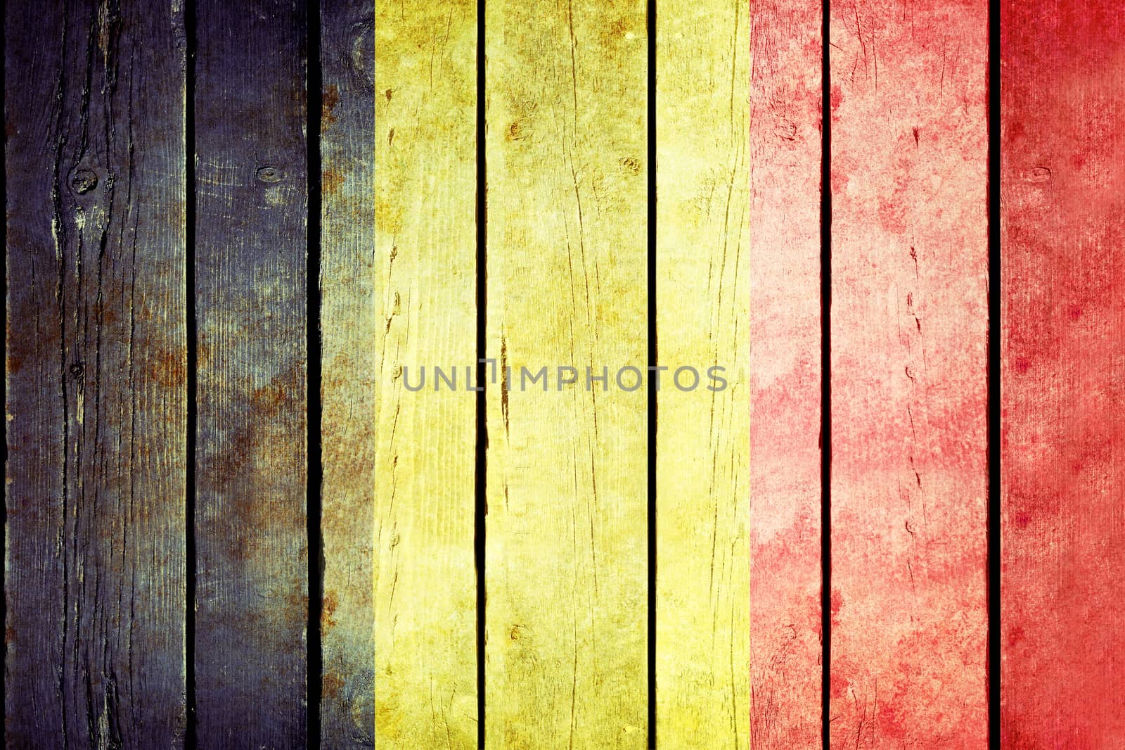 Belgium wooden grunge flag. Belgium flag painted on the old wooden planks. Vintage retro picture from my collection of flags.
