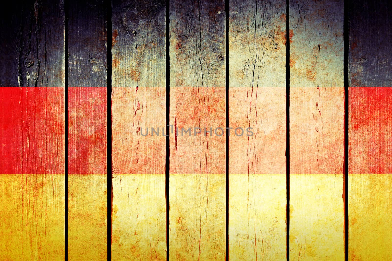 Germany wooden grunge flag. Germany flag painted on the old wooden planks. Vintage retro picture from my collection of flags.