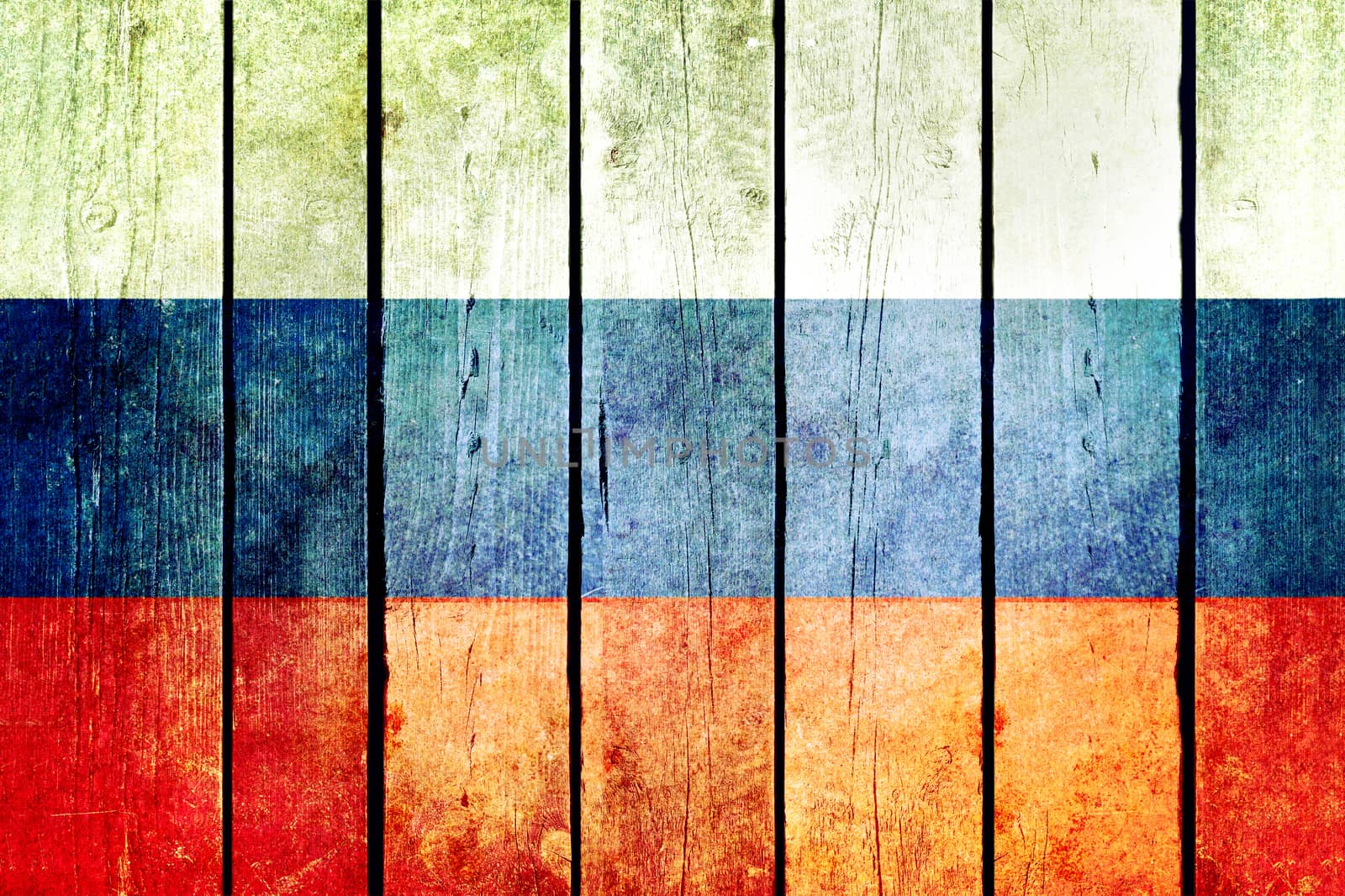 Russia wooden grunge flag. Russia flag painted on the old wooden planks. Vintage retro picture from my collection of flags.