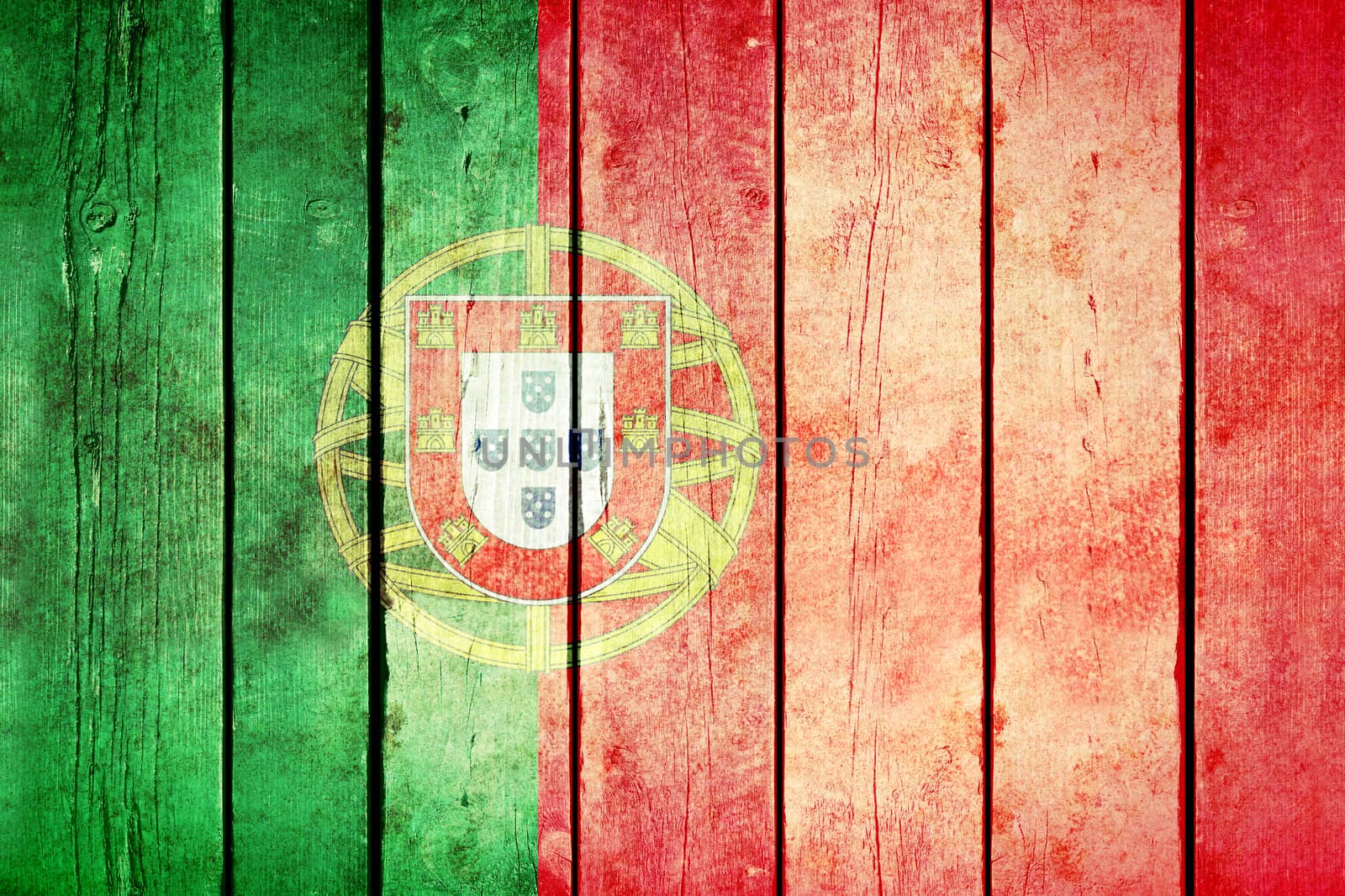 Portugal wooden grunge flag. Portugal flag painted on the old wooden planks. Vintage retro picture from my collection of flags.