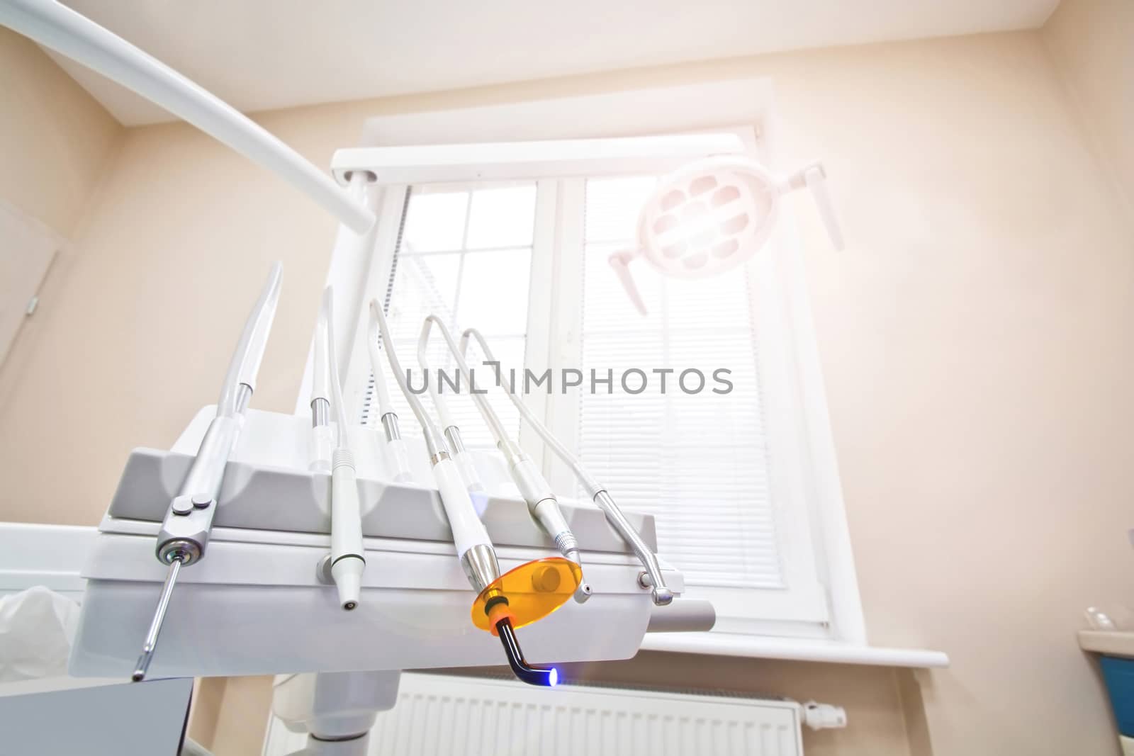 Professional Dentist tools in the dental office. Dental Hygiene and Health conceptual image.