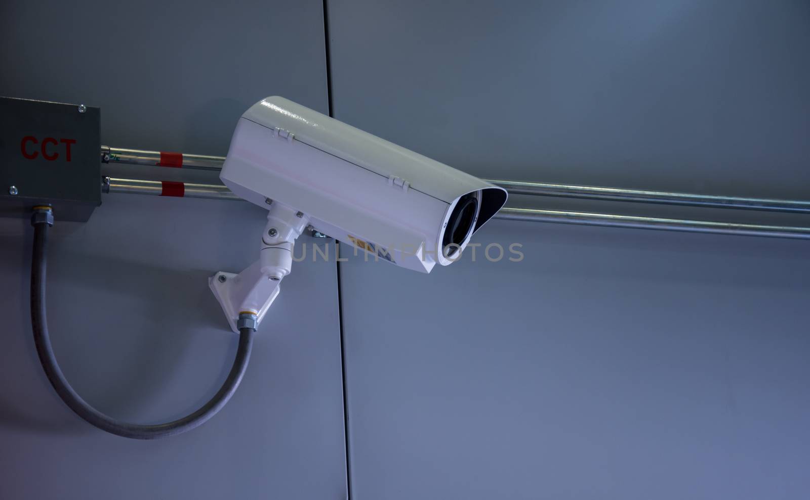 CCTV camera or surveillance operating with electric door in back
