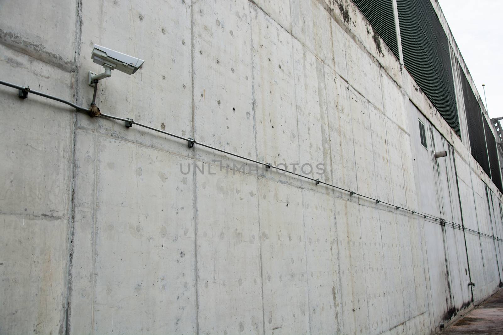 CCTV camera or surveillance operating with electric door in back