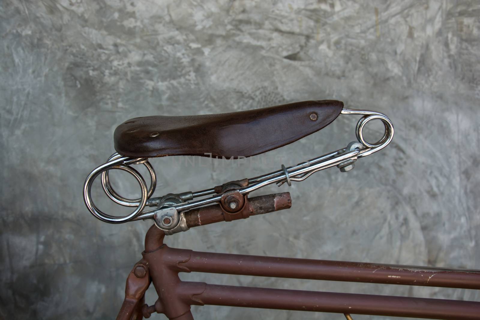vintage leather bike saddle with metal spring