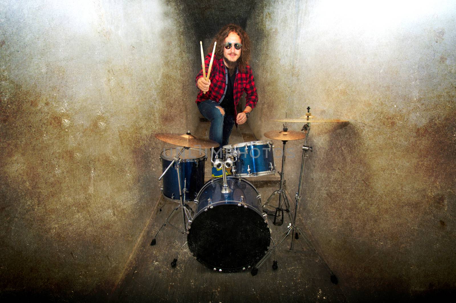 Drums conceptual image. Rock drummer and his drum set. by satariel