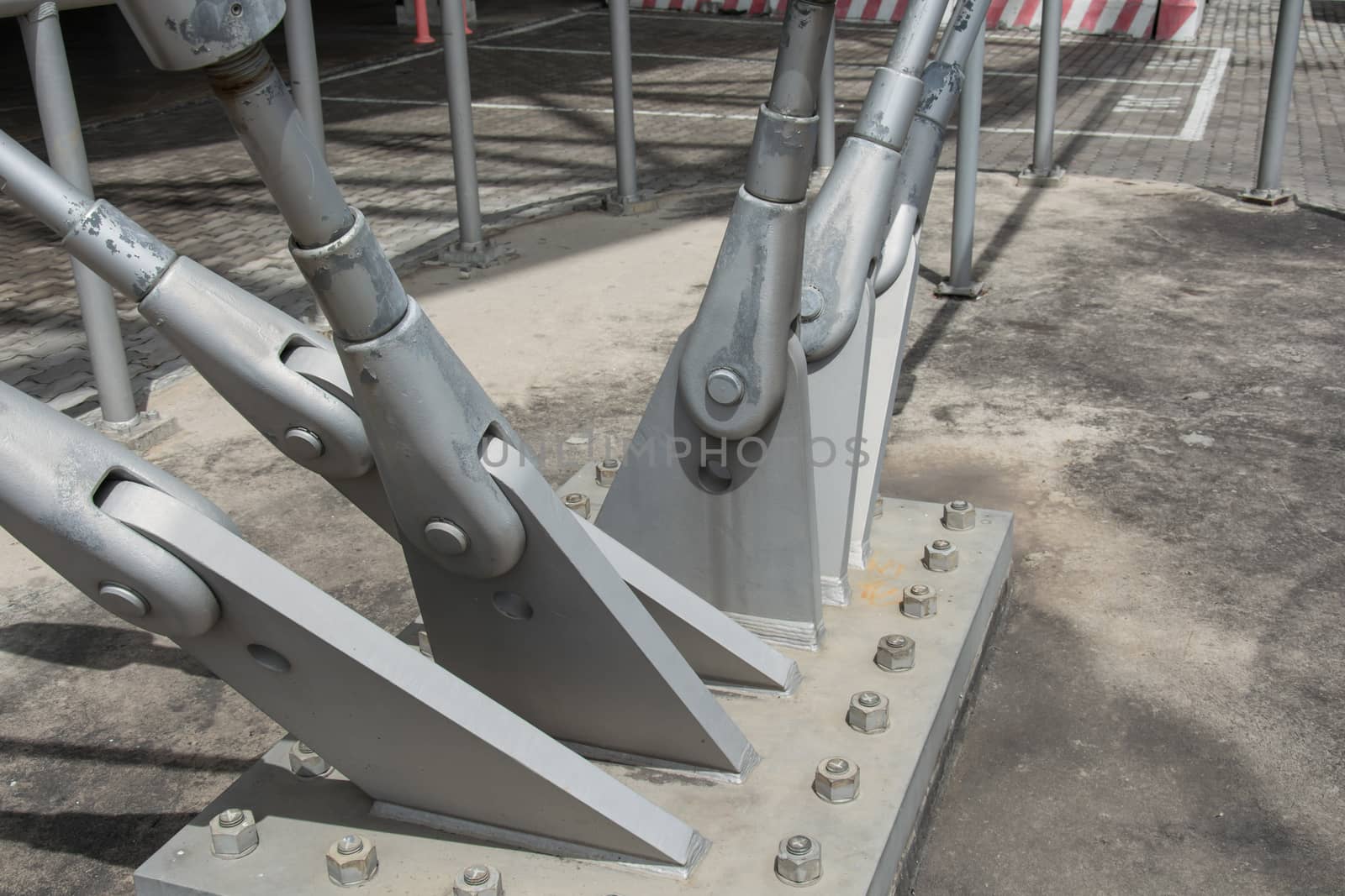 Steel column support with bolts and nuts.