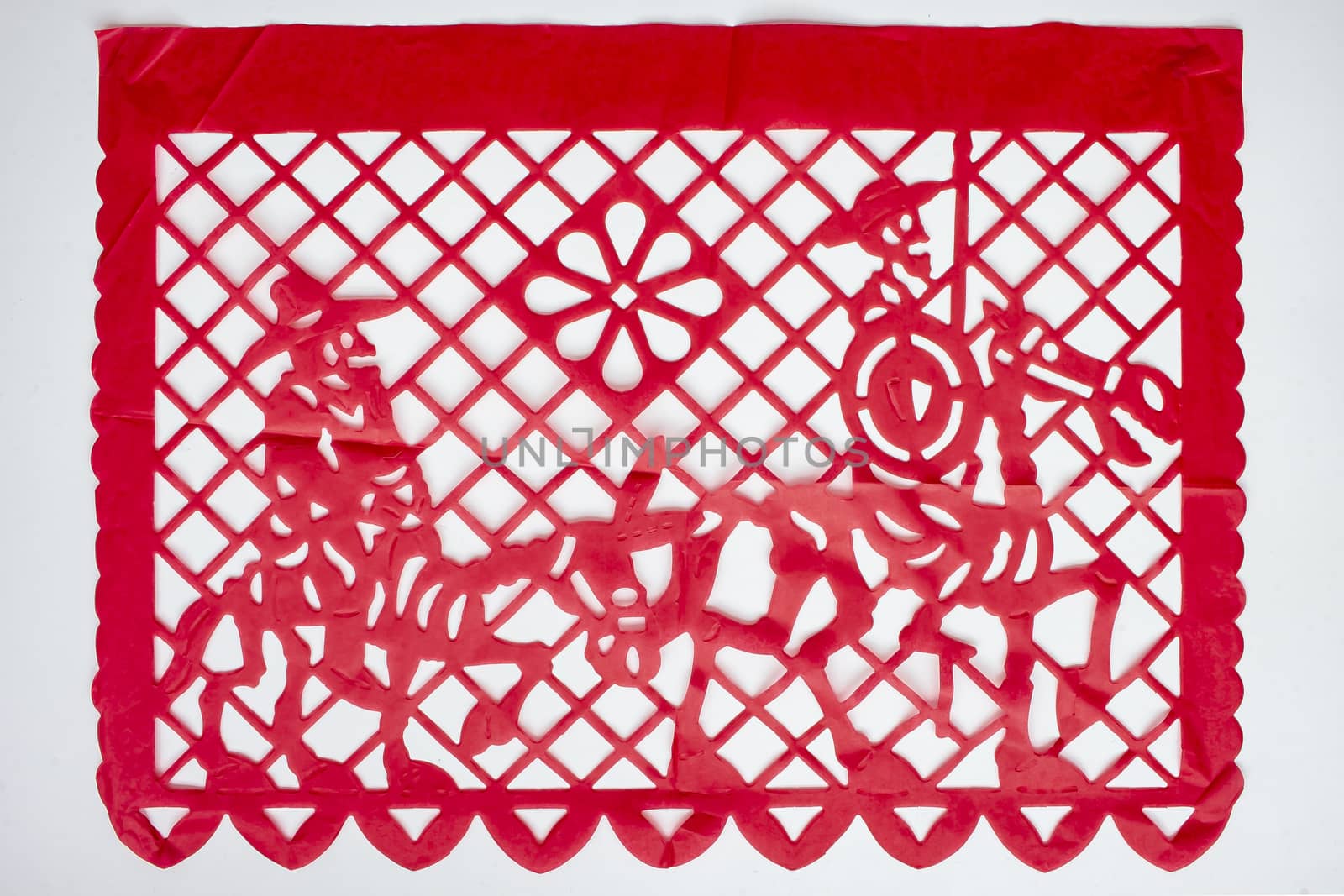 Day of the Dead, Papel Picado. Red Real traditional Mexican paper cutting flag. Isolated on white background. by oasisamuel