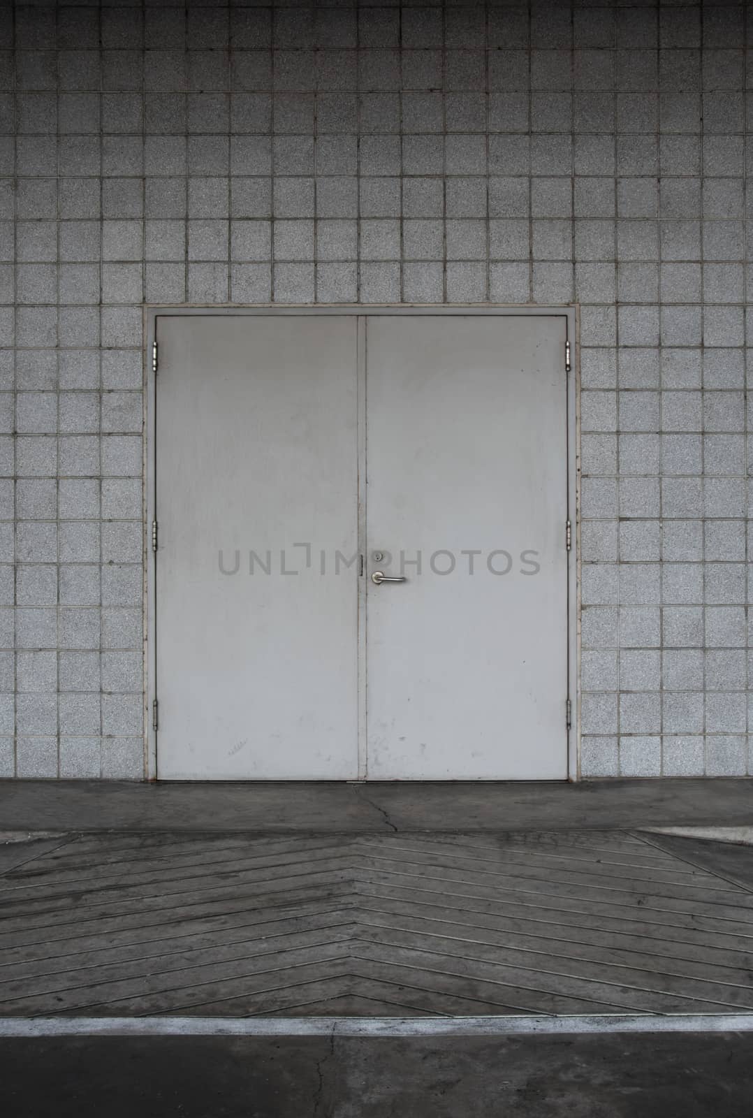 steel door and concrete surrounding.