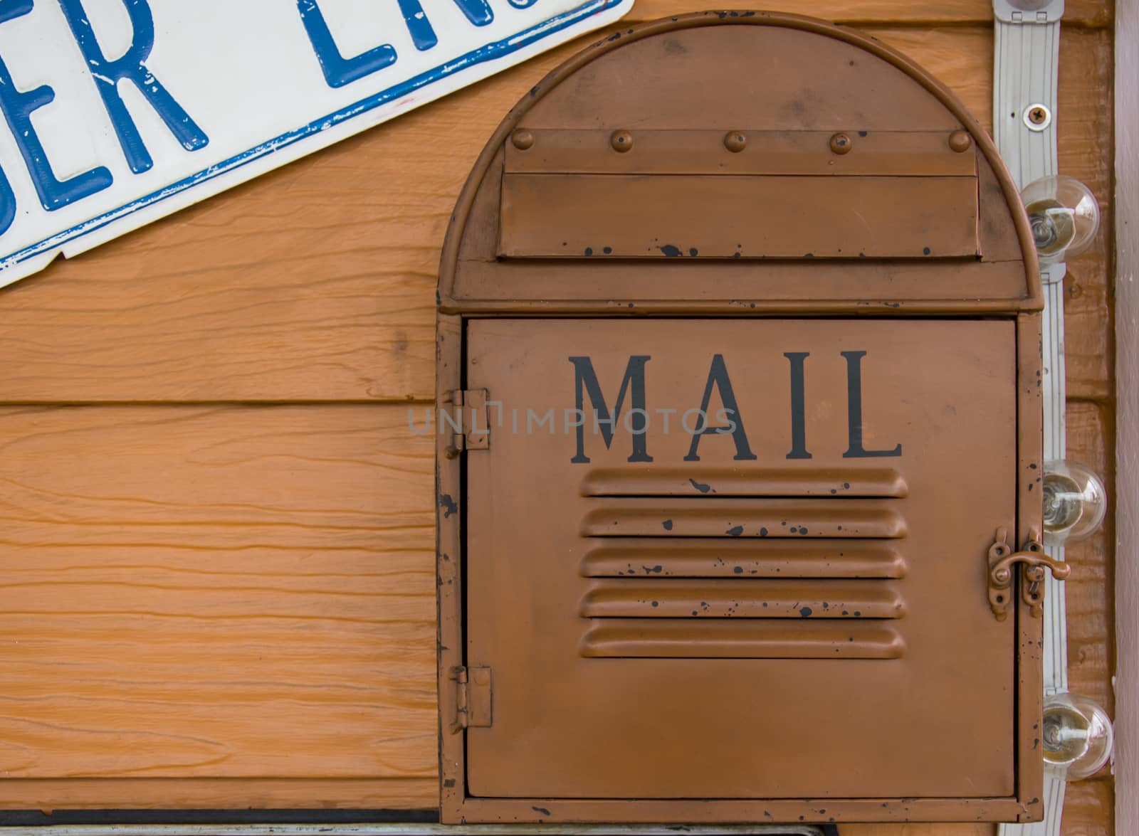 vintage mailbox on wood wall