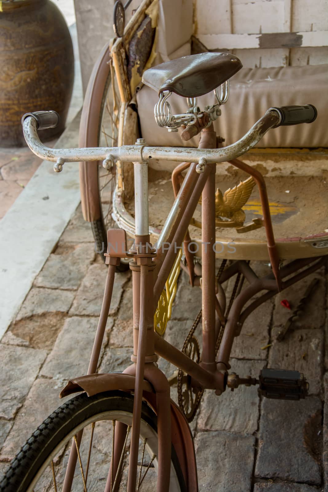 Old three-wheeler,Thailand tricycle in vintage style