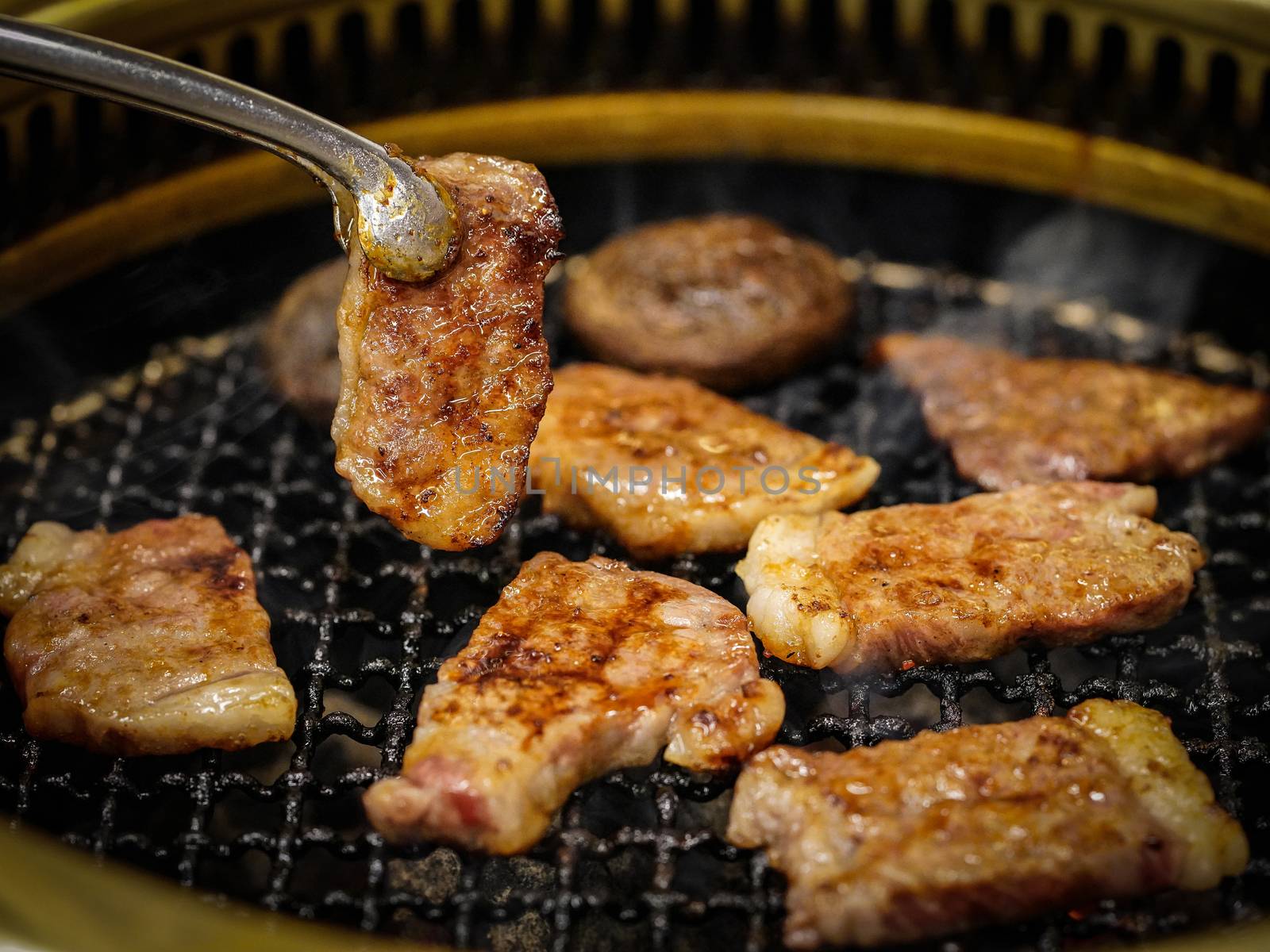 Matsusaka beef grilling on griddle pan. Matsusaka City, Japan. (Japan's Most Expensive Beef)