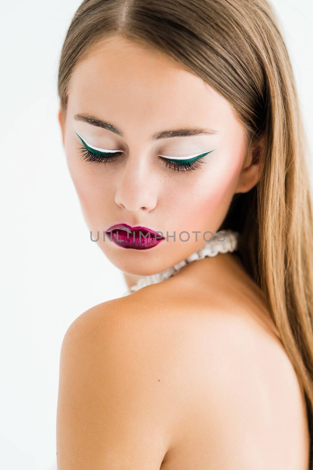 girl in a white blouse and black skirt on a white background