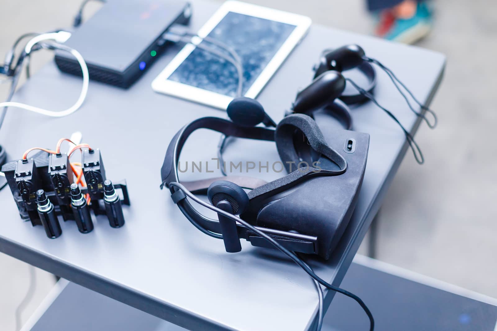 A desk with a computer mouse on a table. High quality photo