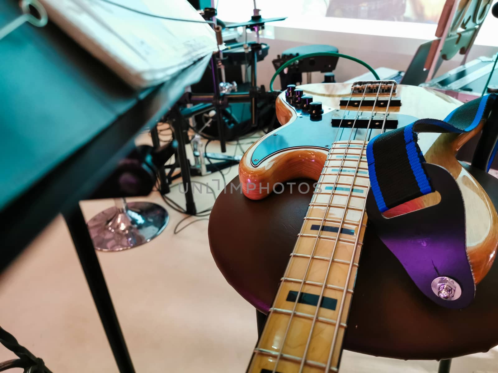 A guitar sitting on a table. High quality photo