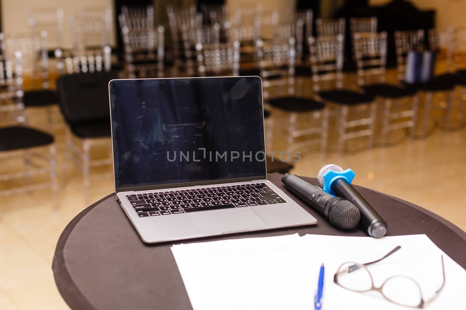 A laptop computer sitting on top of a table by Andelov13