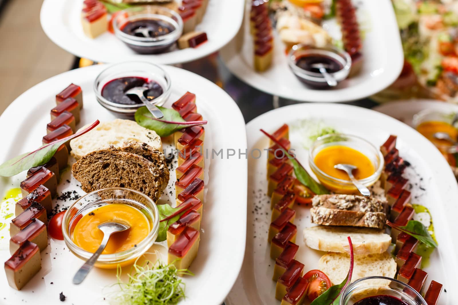A table topped with plates of food on a plate. High quality photo