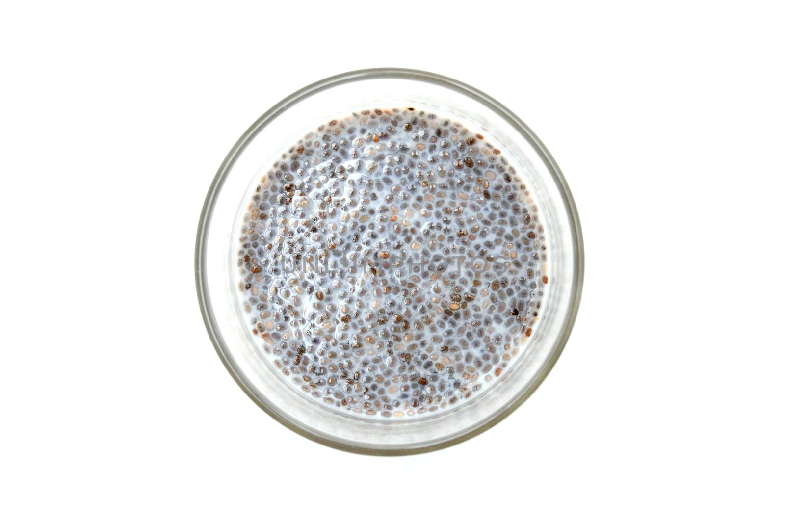 Chia Pudding glass over white background top view