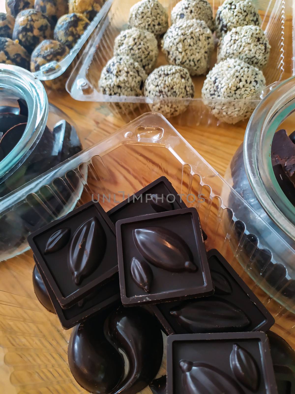 Selection of handmade chocolates. Chocolate is one of the most popular holiday gifts. On Valentine's Day, a box of chocolates is traditional, usually presented with flowers and greeting card.