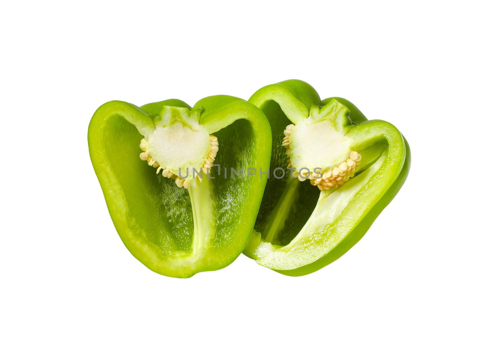 Halved raw green bell pepper isolated on white
