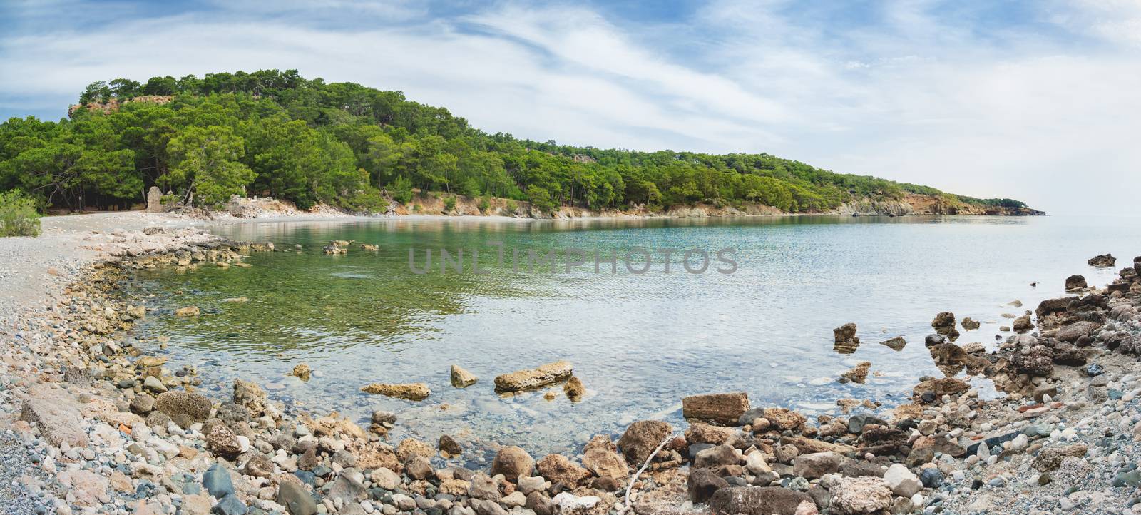 Panorama view of North Harbour of Phaselis. Ruins of Greek city on the coast of ancient Lycia. Architectural landmark near modern town Tekirova in the Kemer district of Antalya Province in Turkey. by aksenovko
