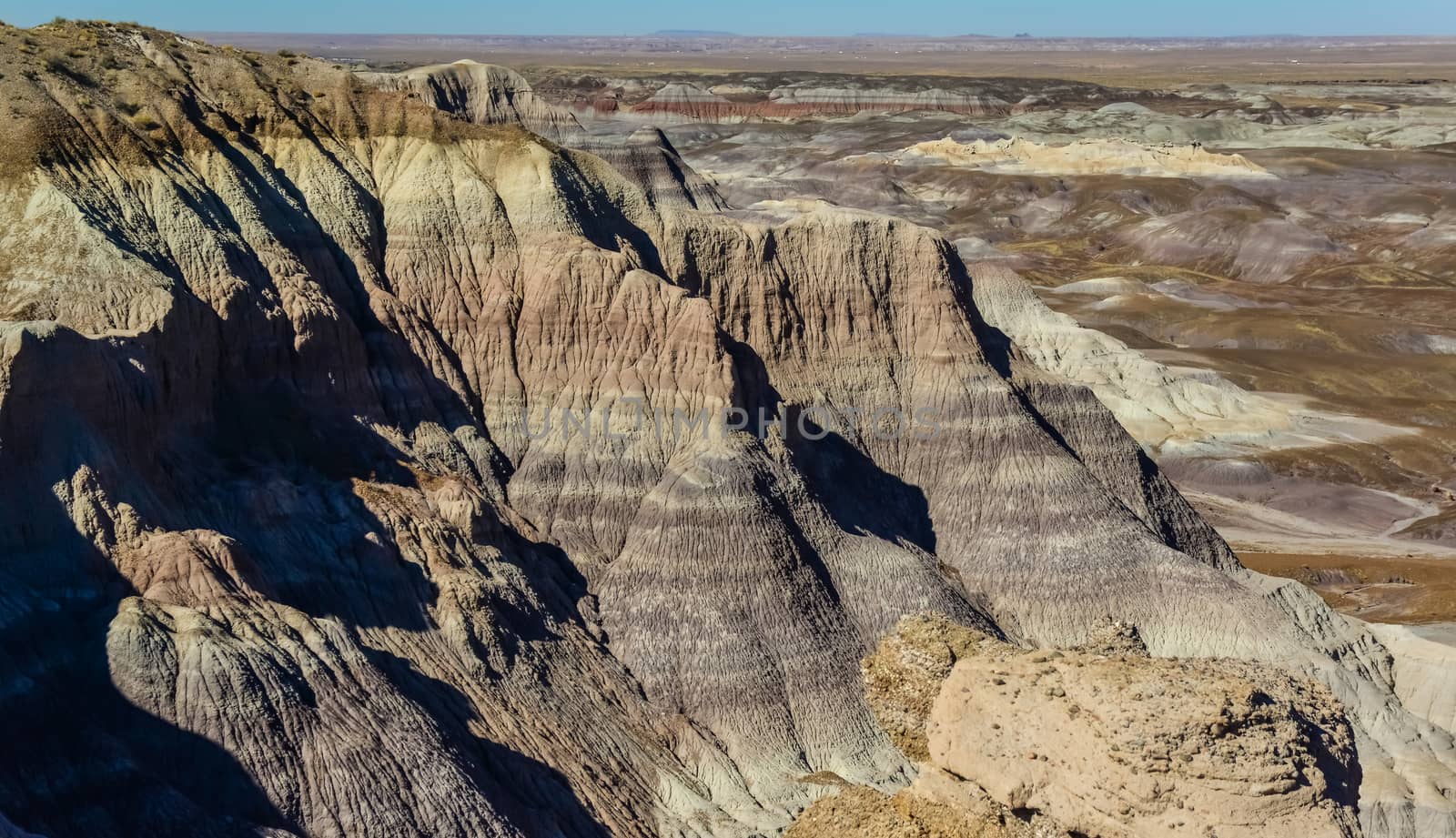 The Painted Desert on a sunny day. Diverse sedimentary rocks and clay washed out by water. Petrified Forest National Park, USA,  Arizona