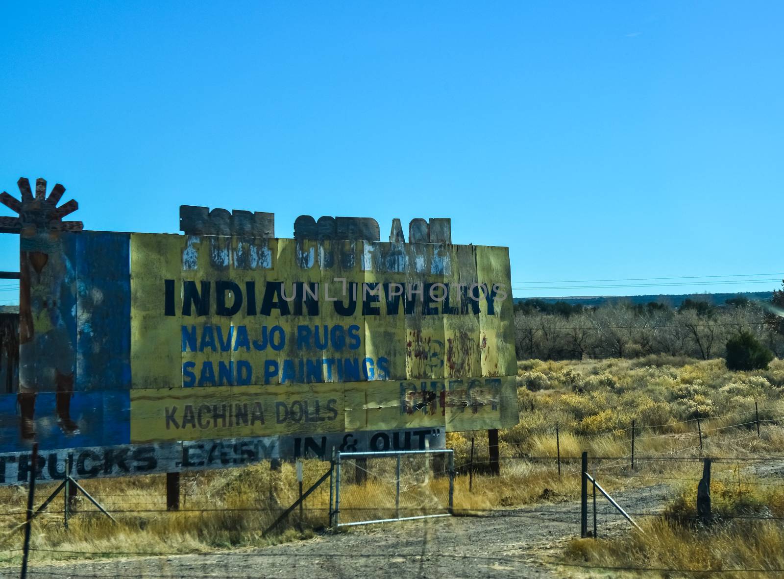 USA, ARIZONA - NOVEMBER 17, 2019:  old advertising signs along a road on an Indian reservation in a suburb of Phoenix, Arizona