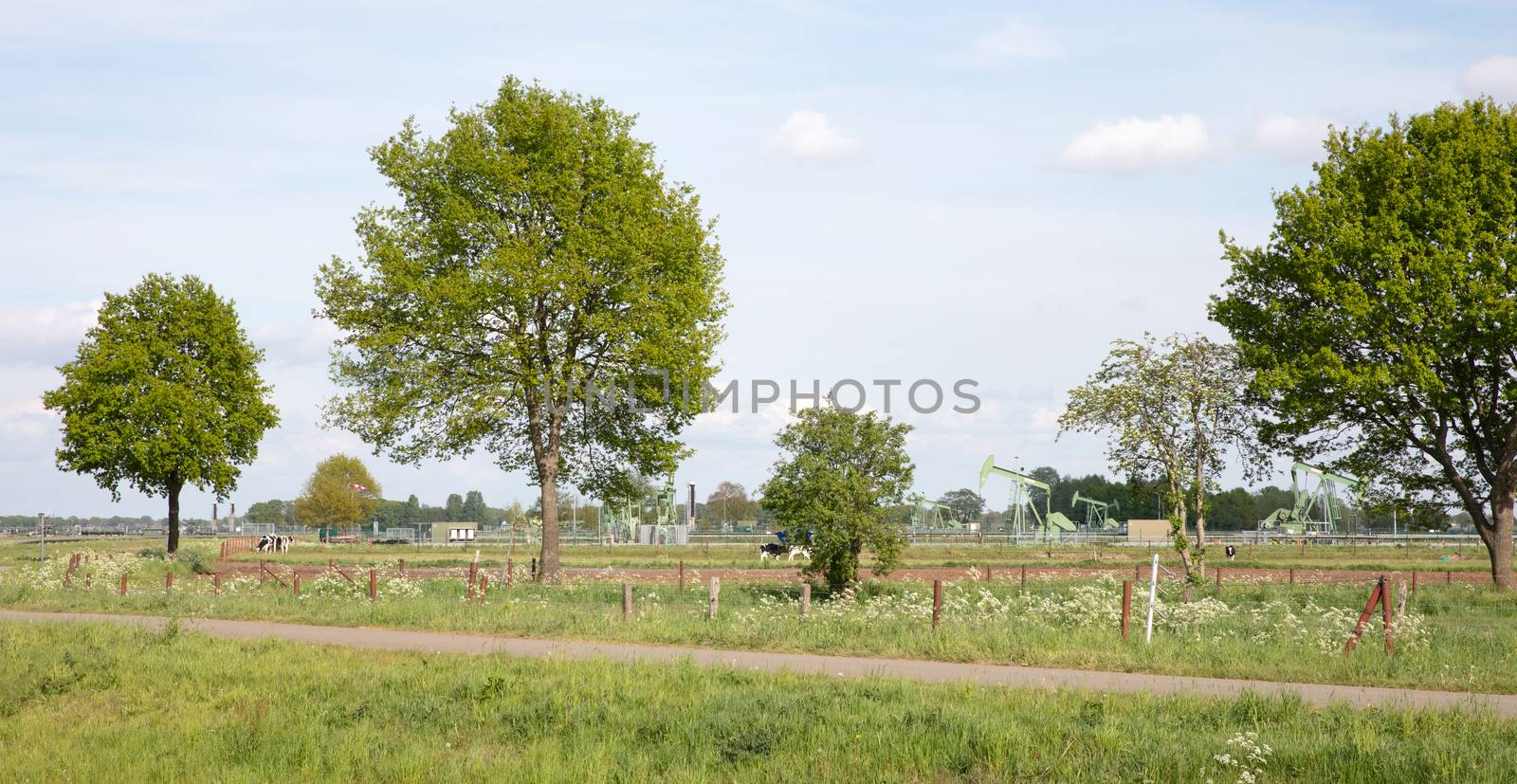 Landscape with oil pump jack by michaklootwijk