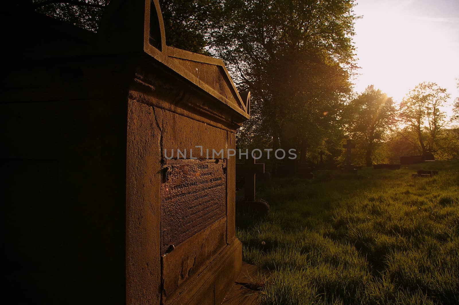 Tomb in the evening sunlight in a Prestwich cemetery, UK