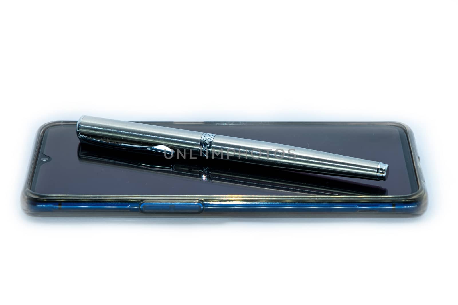 Luxury pen on a smart phone on white Background. by peerapixs