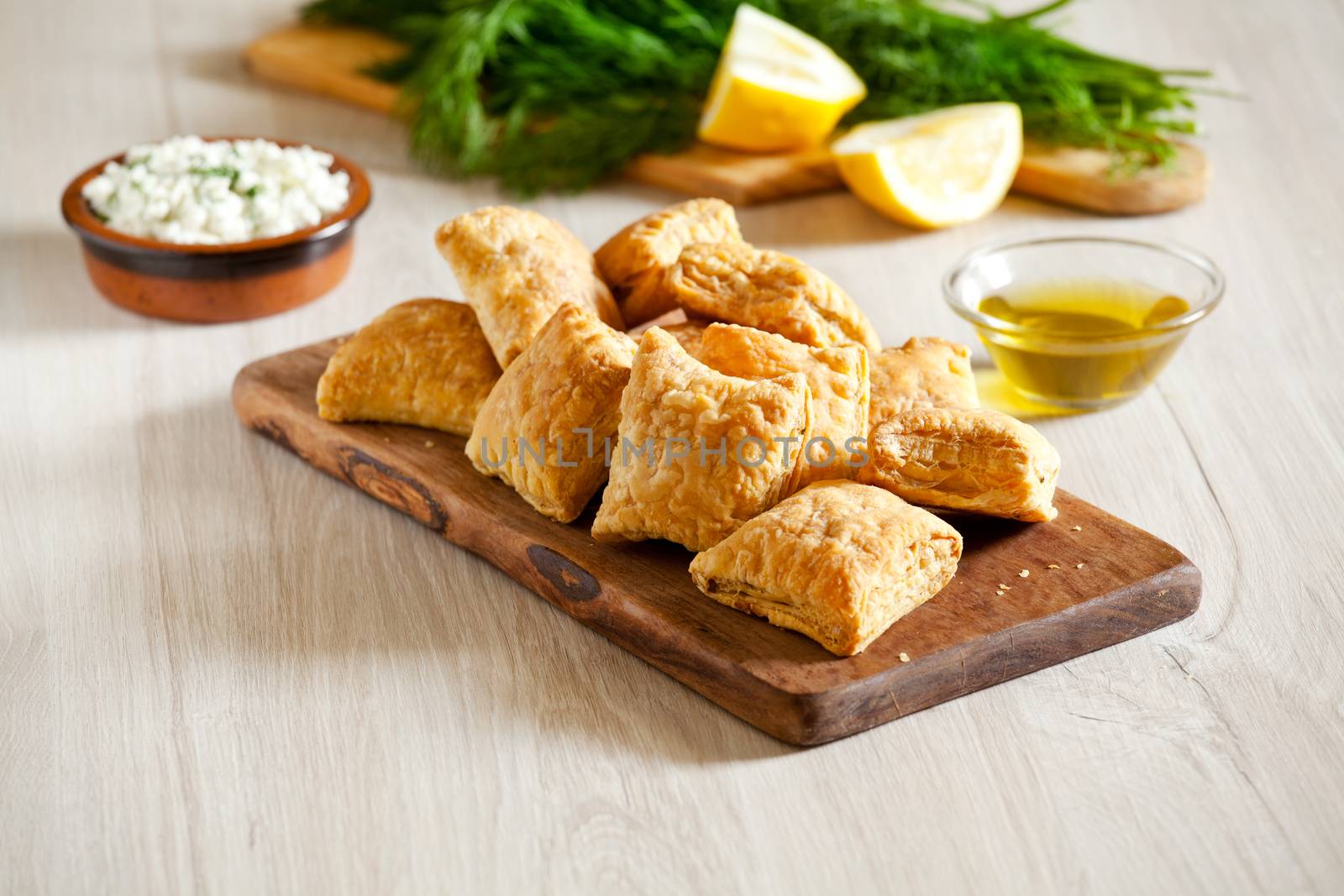 Small Homemade Greek Cheese Pies With Fresh Herbs by mpessaris