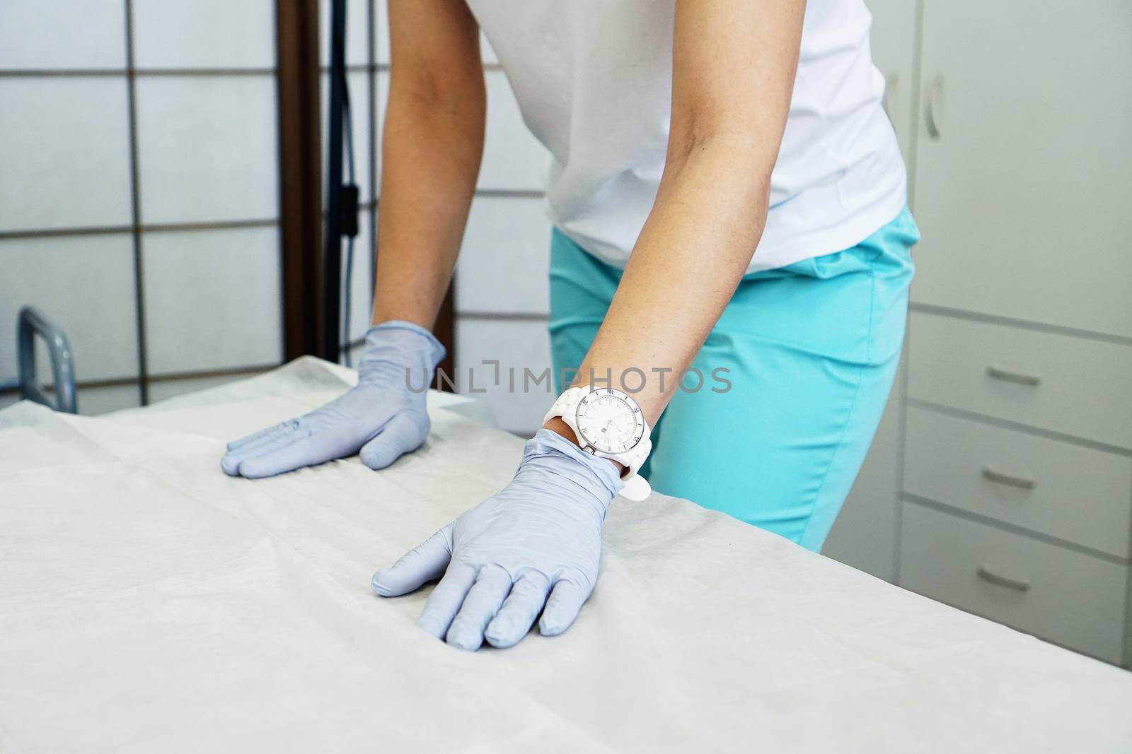 The master - beautician prepares the workplace In a beauty salon