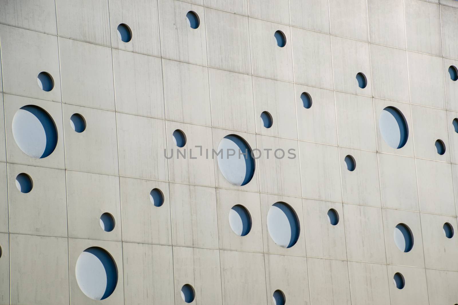 Background texture. wall with round holes in the form of gas bubbles. by fedoseevaolga