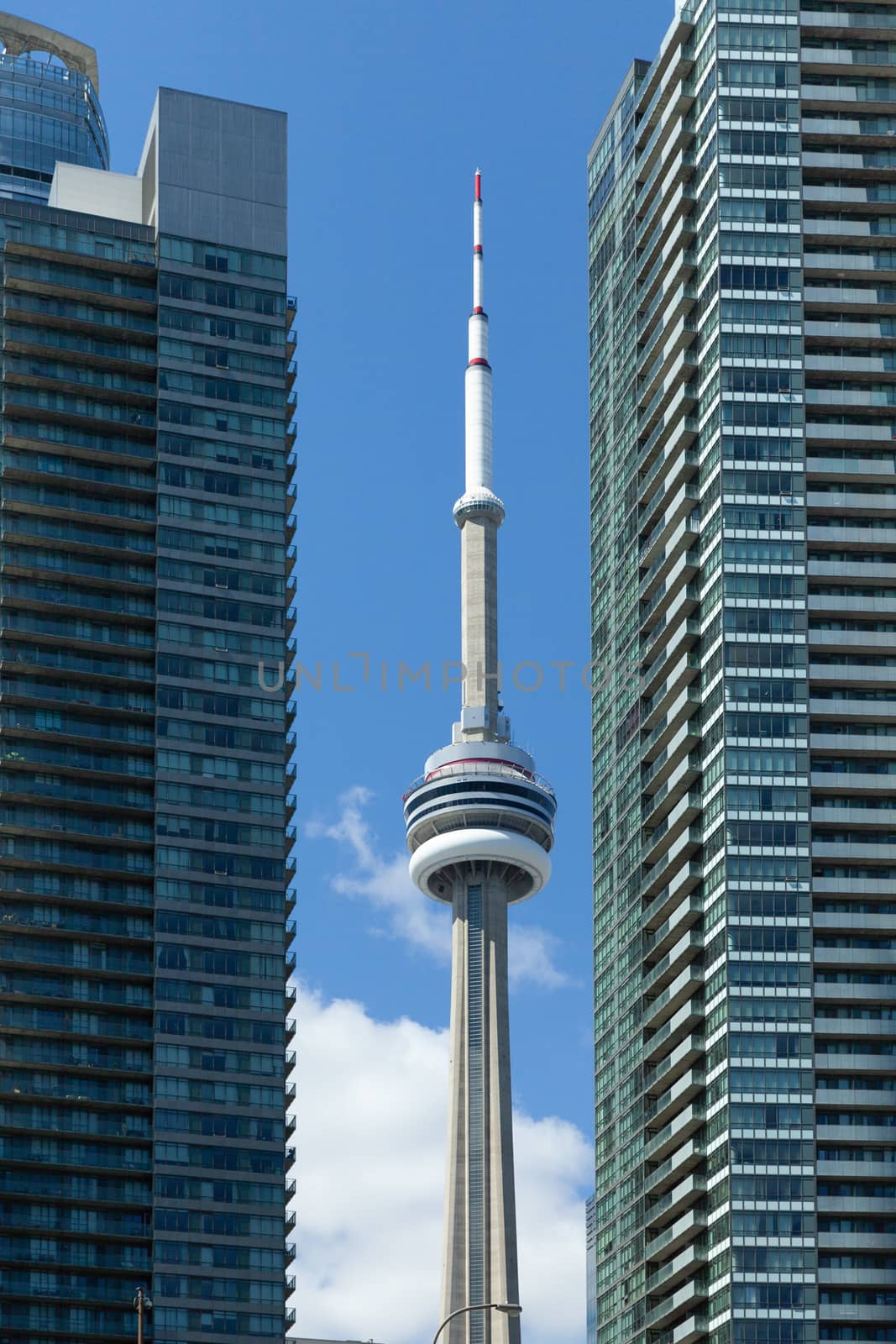 Toronto, Canada - 9 September 2017: CN Tower view between two skyscrapers