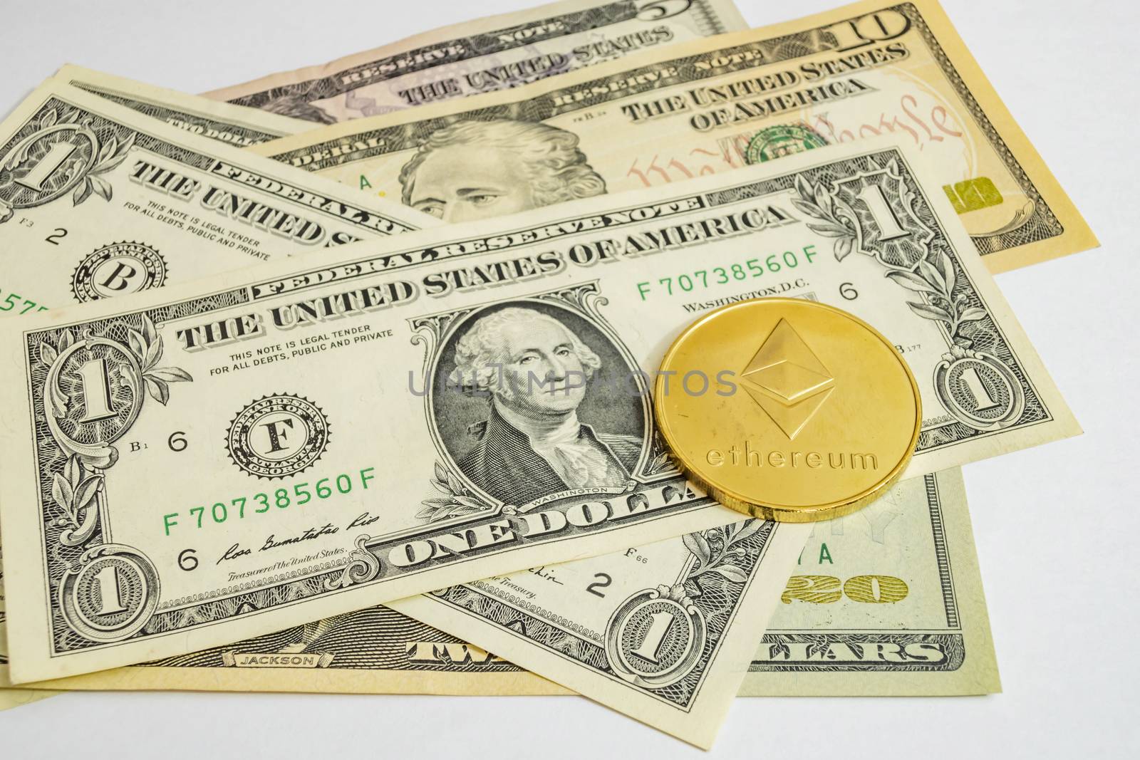 close up cryptocurrency coins on banknotes background