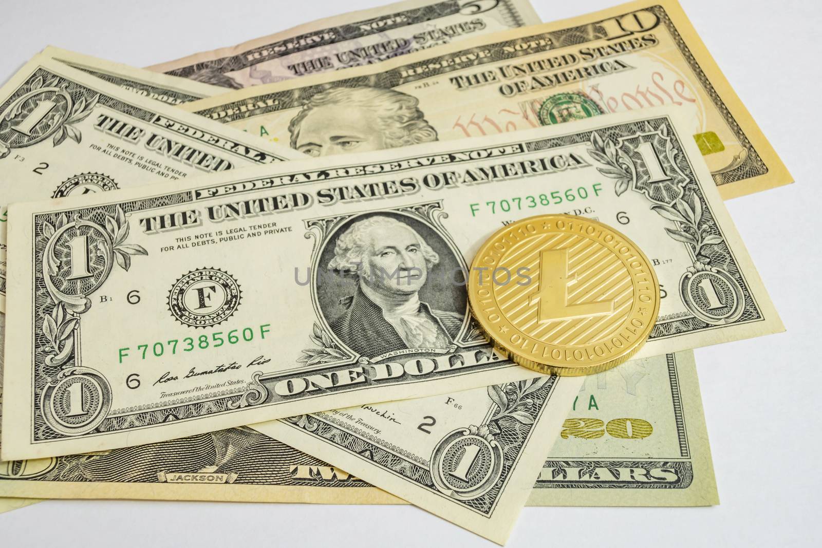 close up cryptocurrency coins on banknotes background