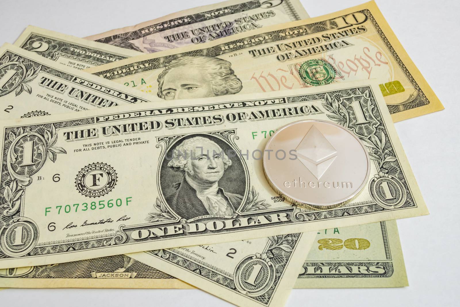 close up cryptocurrency coins on banknotes background