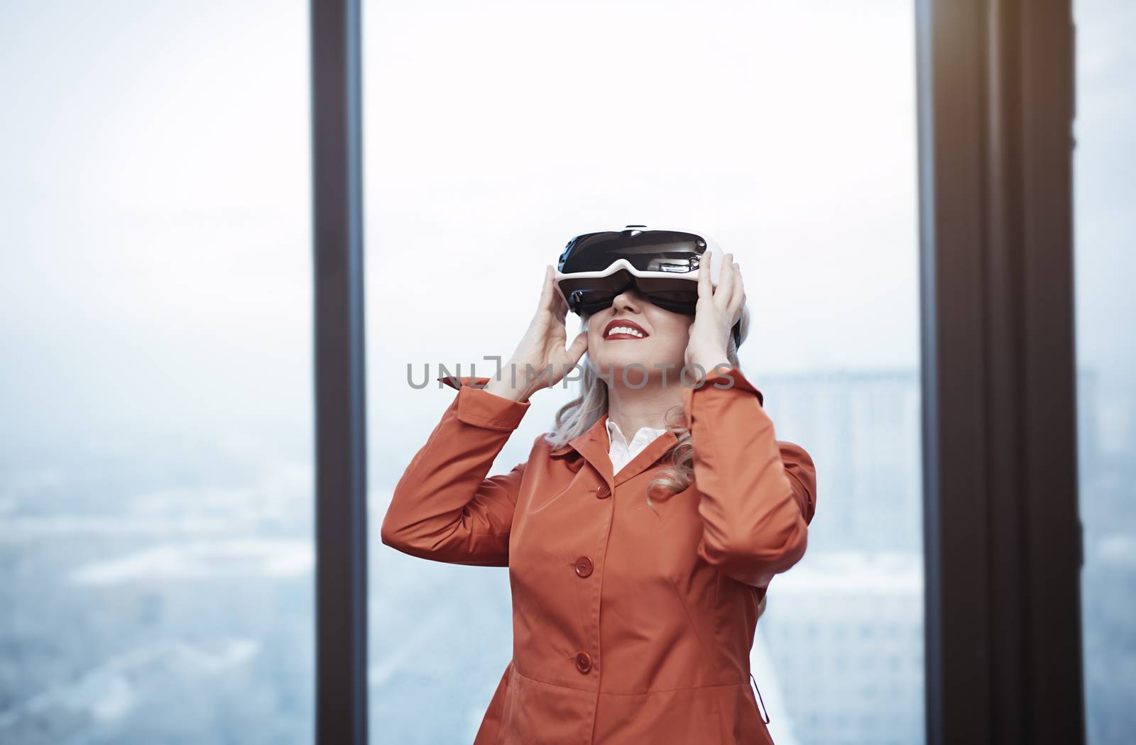 Woman at office wearing Virtual reality headset by Novic