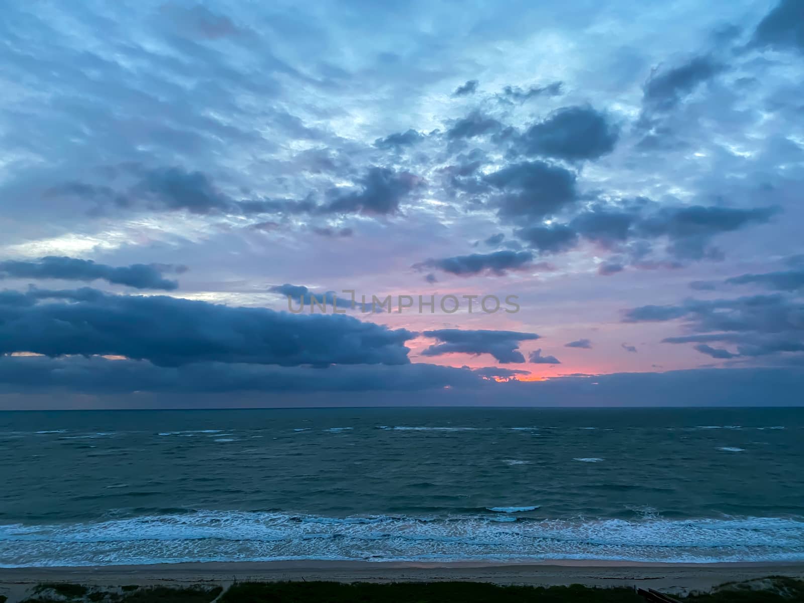 A vibrant sunrise over the Atlantic Ocean by Jshanebutt