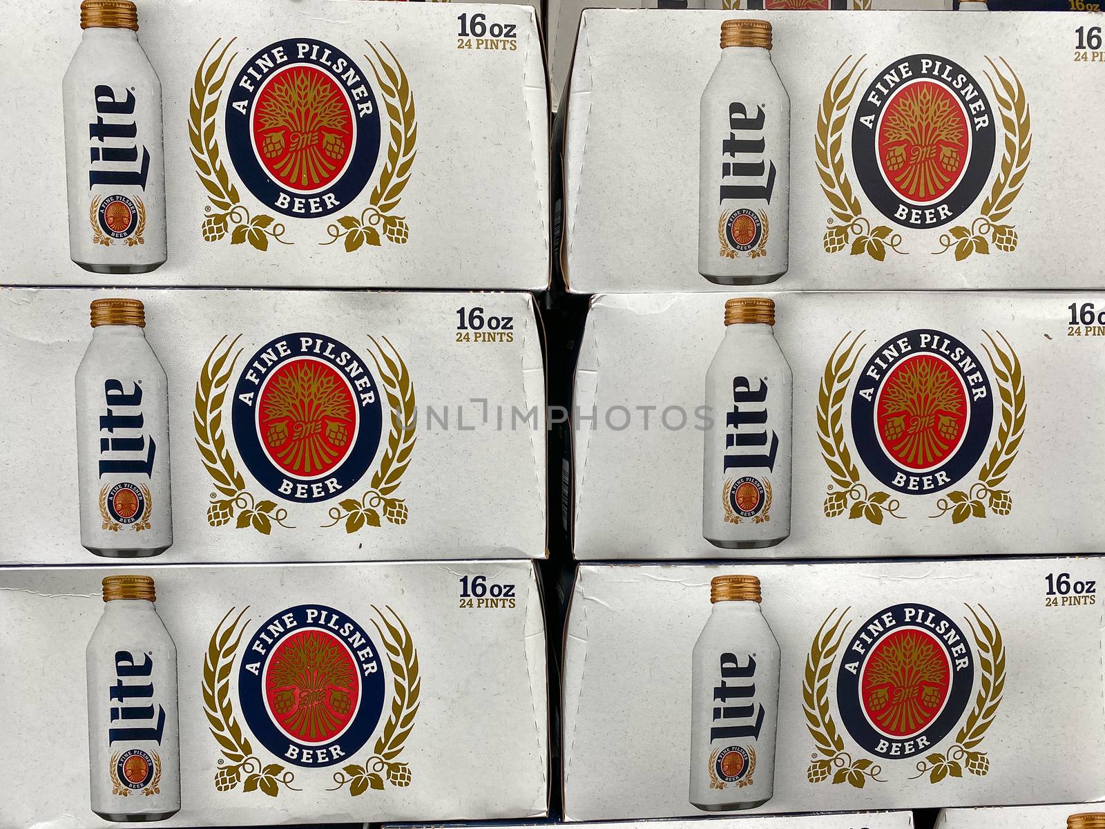 Cases of cans of Miller Lite Beer at a grocery store by Jshanebutt