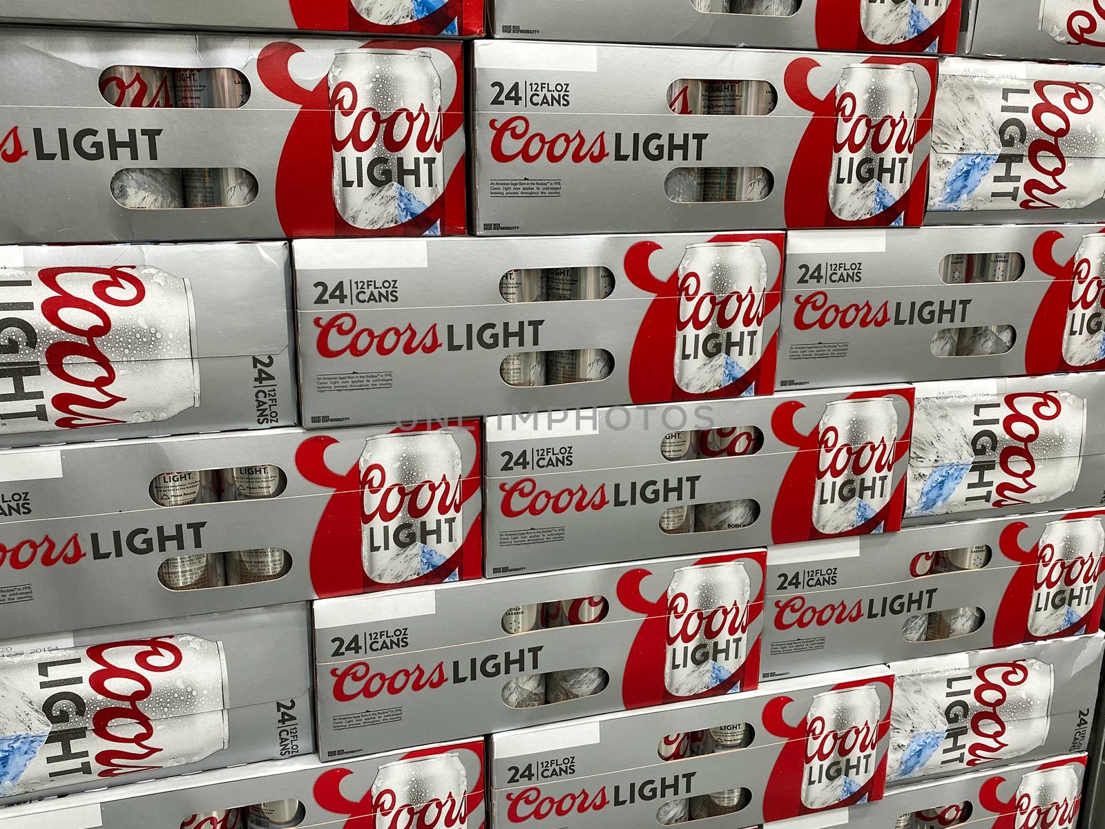 Orlando, FL/USA-5/15/20: Cases of cans of Coors Light Beer at a grocery store waiting for customers to purchase.  Coors Light is a product of American Moulson Coors Brewing Company.
