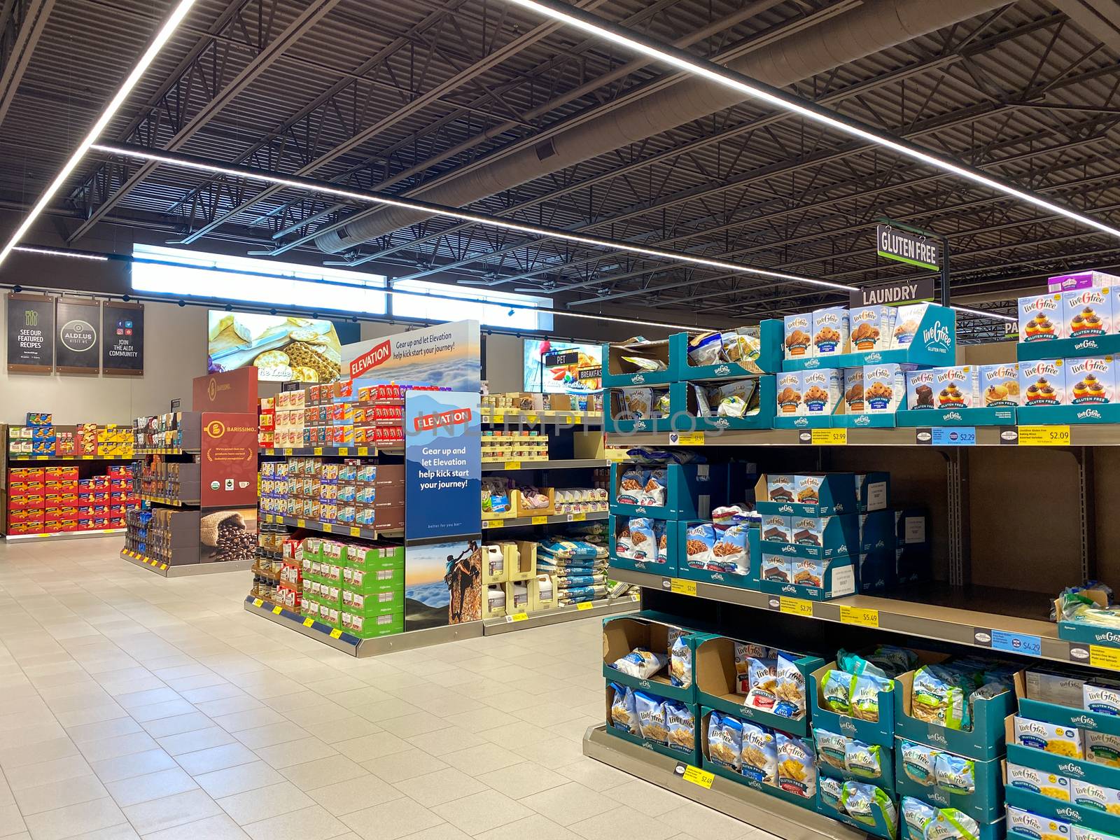 An overview of multiple  aisles of an Aldi store. by Jshanebutt